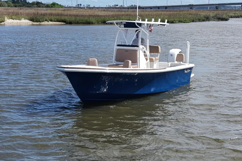 Slide: The Image of 2022 Pair Customs 21 Center Console DV boat on calm water. - 7