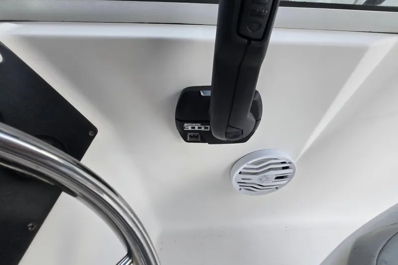 Slide: The Image of 1994 Sea Pro 190 Dual Console boat dashboard with steering wheel and control panel. - 11