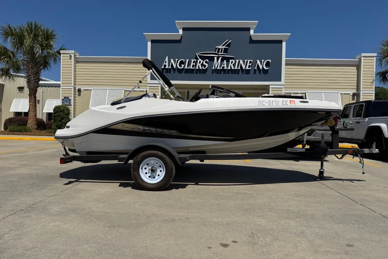 The Image of 2017 Scarab 165 H.O. Platinum boat on trailer at Anglers Marine NC dealership. - 1