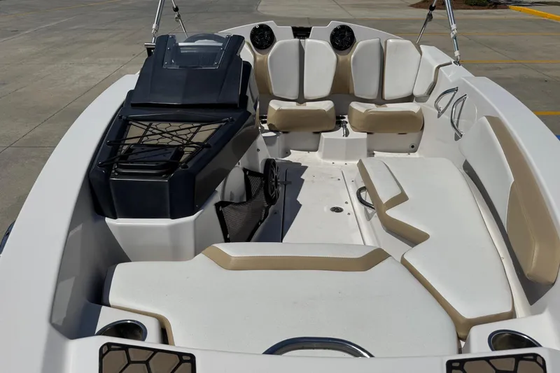 Slide: The Image of 2017 Scarab 165 H.O. Platinum boat interior with beige and white seating. - 11