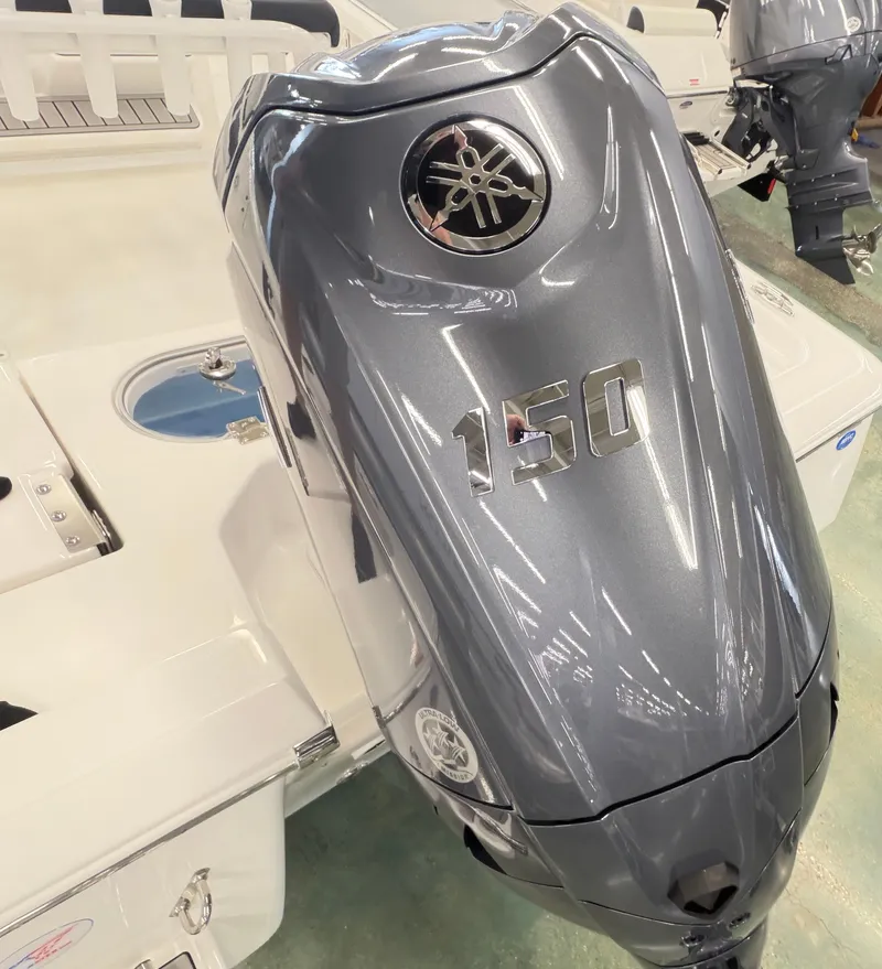 Slide: The Image of 2026 Tidewater 2110 Bay Max with Yamaha 150 HP outboard motor. - 19