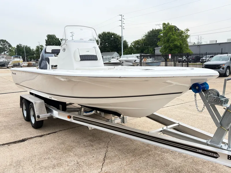 Slide: The Image of 2026 Tidewater 2110 Bay Max boat on trailer outdoors. - 3