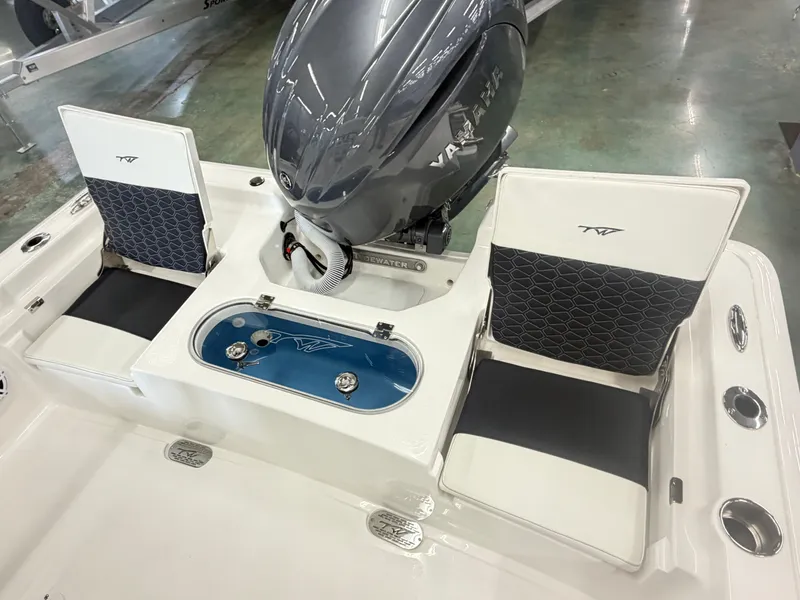 Slide: The Image of 2026 Tidewater 2110 Bay Max boat with Yamaha engine and seating area. - 8