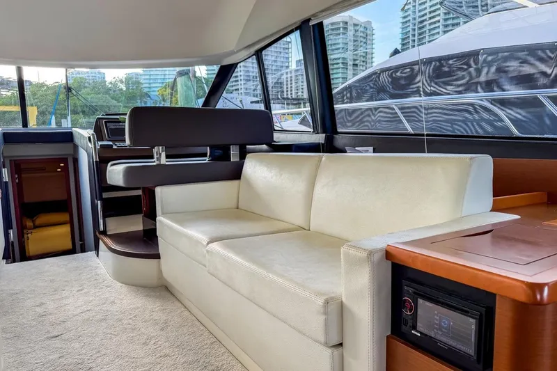 Slide: The Image of Luxurious interior of a 2013 Prestige 500 yacht with cream sofa and modern design. - 5