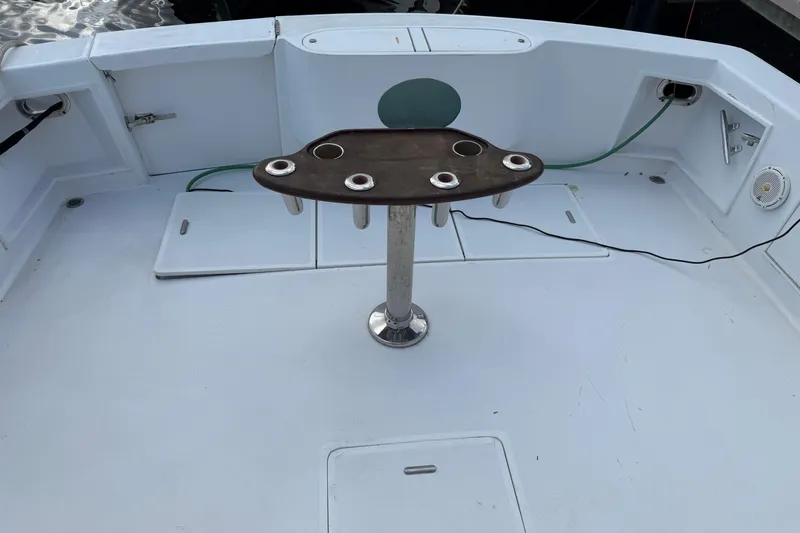 Slide: The Image of Fishing deck of 1985 Ocean Yachts 55 Super Sport with rod holders. - 2