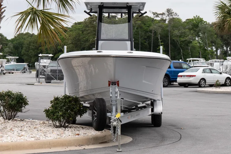 Slide: The Image of 2026 Blazer Bay Makaira 2600 boat on trailer in parking lot. - 3