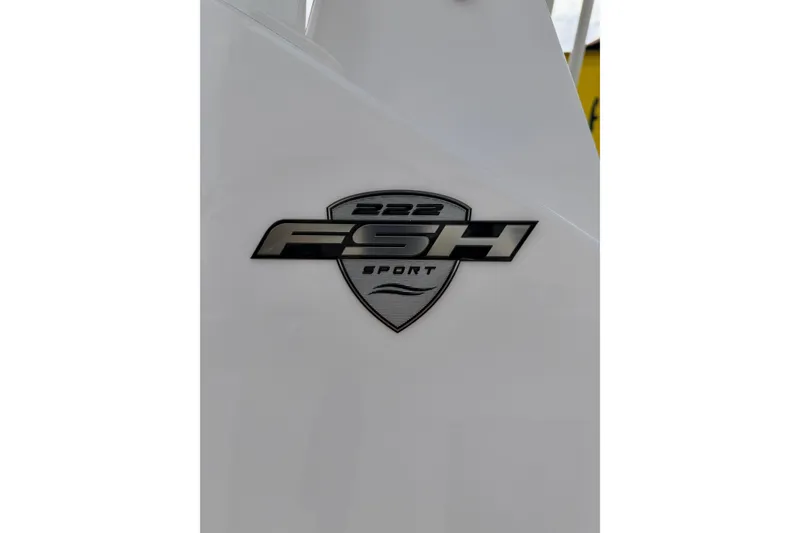 Slide: The Image of 2026 Yamaha Boats 222 FSH Sport logo on white surface. - 20