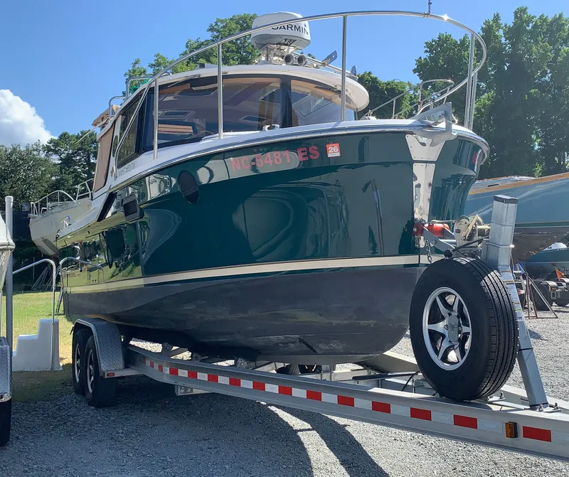 Slide: The Image of 2018 Ranger Tugs R-23 boat on trailer outdoors. - 2