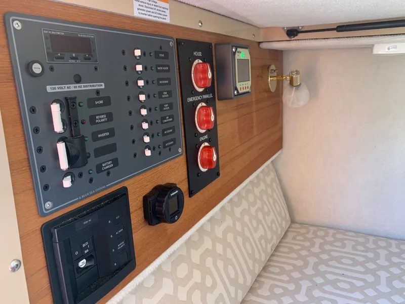 Slide: The Image of Interior view of Ranger Tugs R-23 control panel, 2018 model. - 21