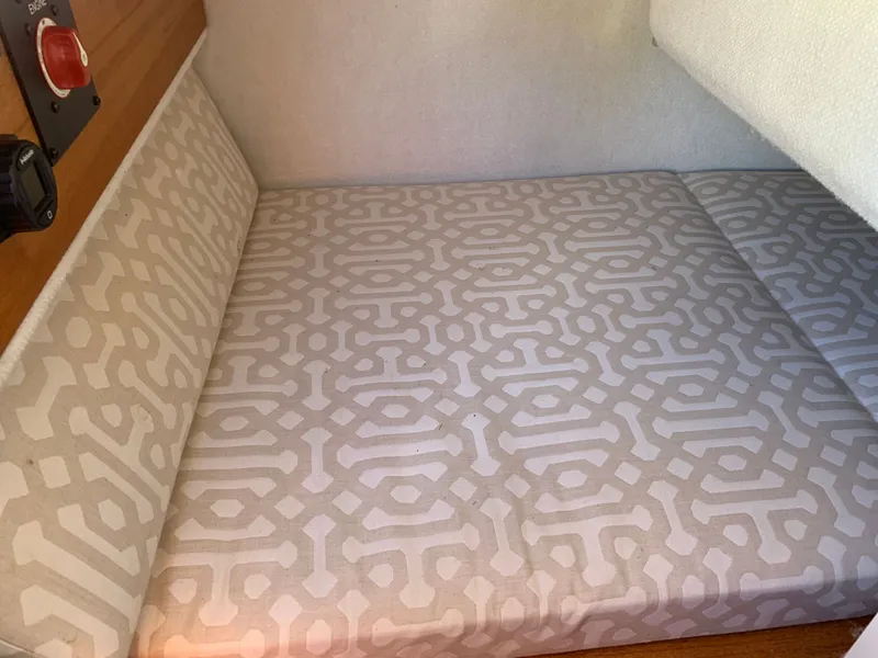 Slide: The Image of Interior of 2018 Ranger Tugs R-23 boat with patterned upholstery. - 22