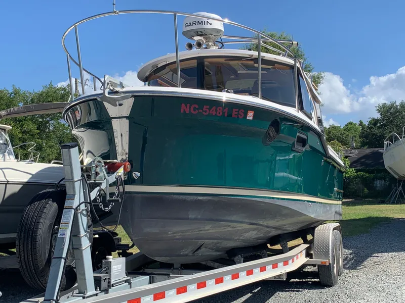Slide: The Image of 2018 Ranger Tugs R-23 boat on trailer, sunny day. - 3
