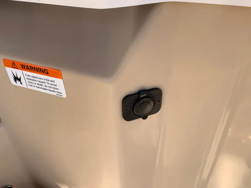 Slide: The Image of Warning label and port on Ranger Tugs R-23 boat, year 2018. - 38