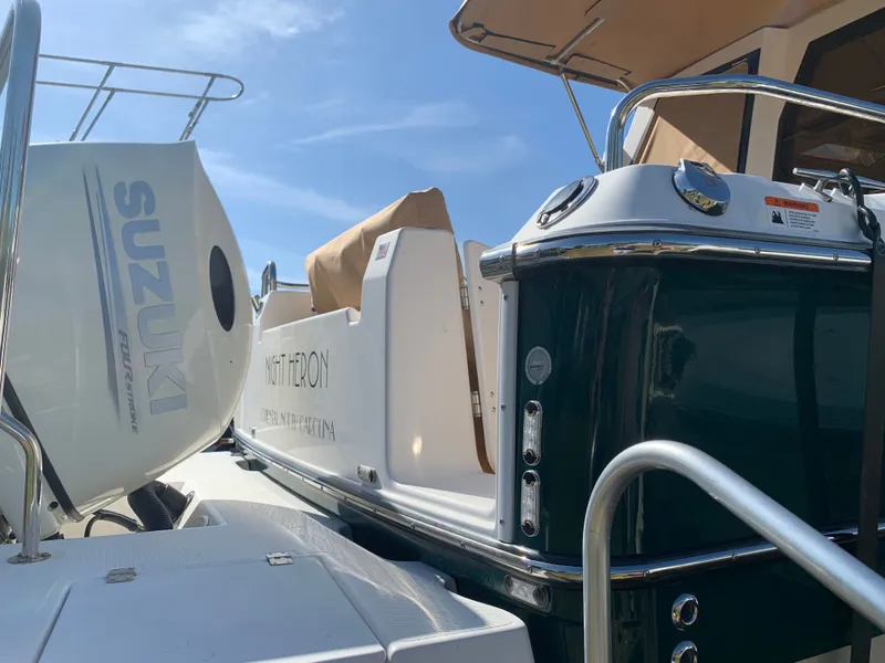 Slide: The Image of 2018 Ranger Tugs R-23 boat with Suzuki outboard motor. - 42