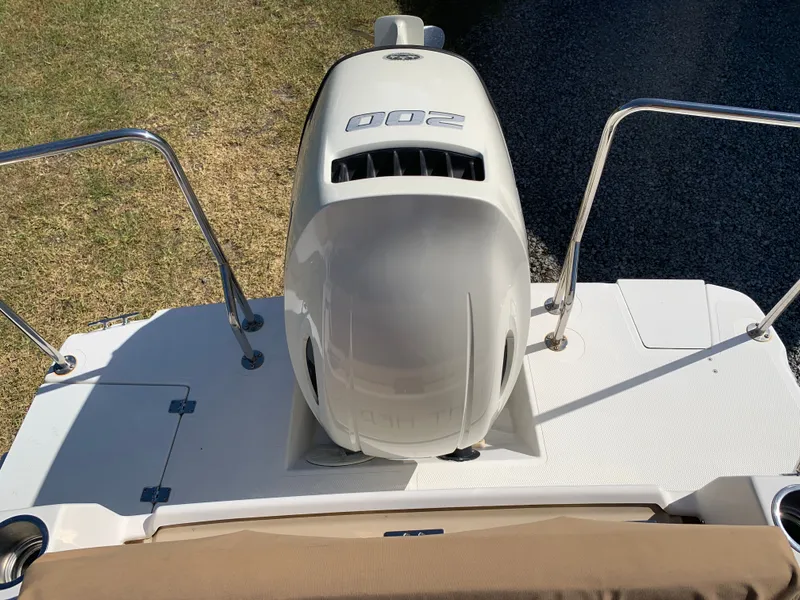 Slide: The Image of Ranger Tugs R-23 2018 with outboard motor on boat deck. - 44
