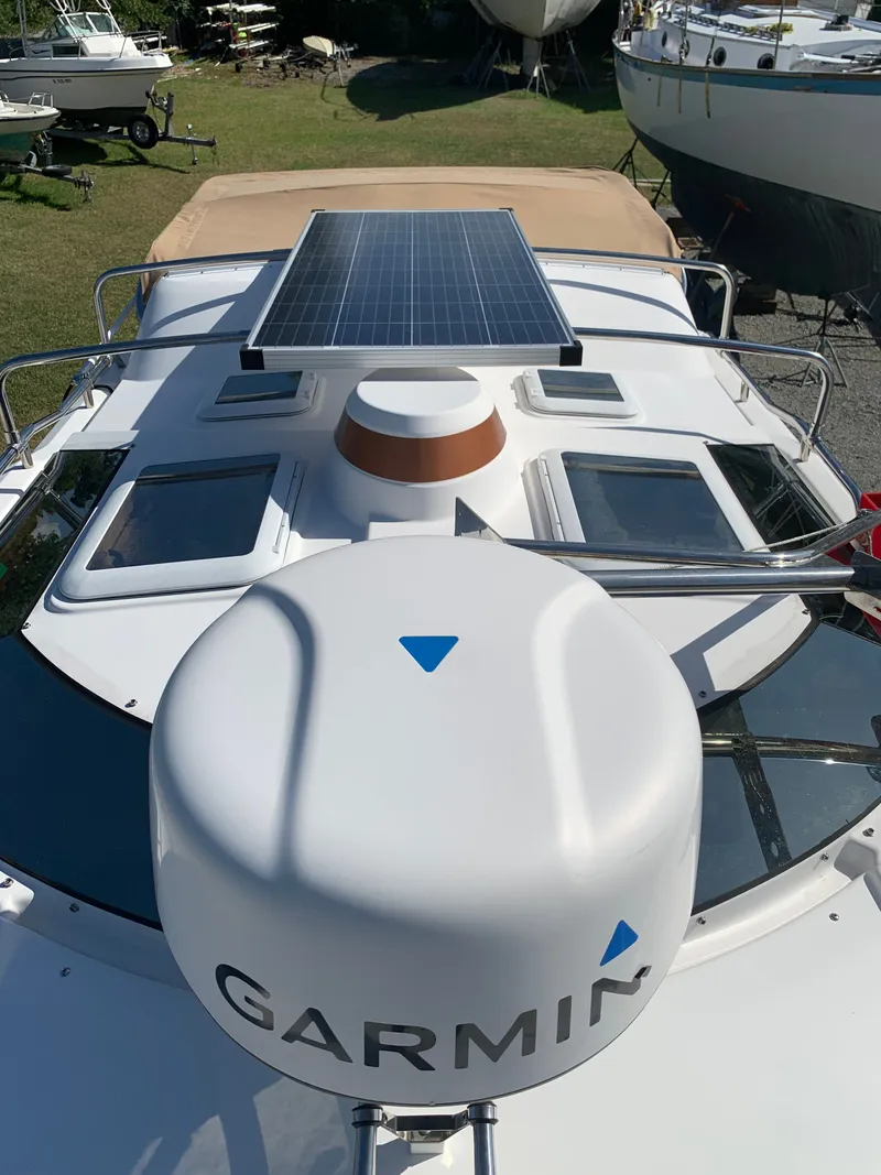 Slide: The Image of 2018 Ranger Tugs R-23 with solar panel and Garmin equipment. - 48