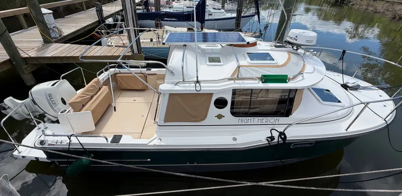 Slide: The Image of 2018 Ranger Tugs R-23 boat docked at marina. - 6