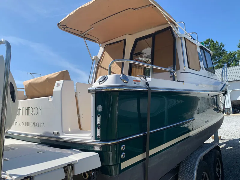Slide: The Image of 2018 Ranger Tugs R-23 boat on trailer, side view. - 8