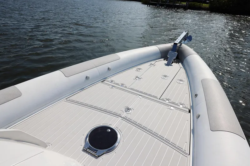 Slide: The Image of Bow view of 2013 Zeta Elle 34 Custom boat on water. - 13