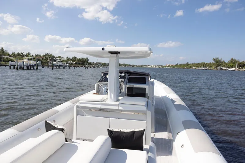 Slide: The Image of Zeta Elle 34 Custom 2013 boat on calm water, clear sky, and distant shoreline. - 17