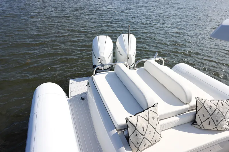 Slide: The Image of Luxury Zeta Elle 34 Custom boat with twin engines on calm water, 2013 model. - 20