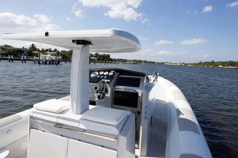Slide: The Image of Zeta Elle 34 Custom 2013 boat on calm water with clear sky. - 23