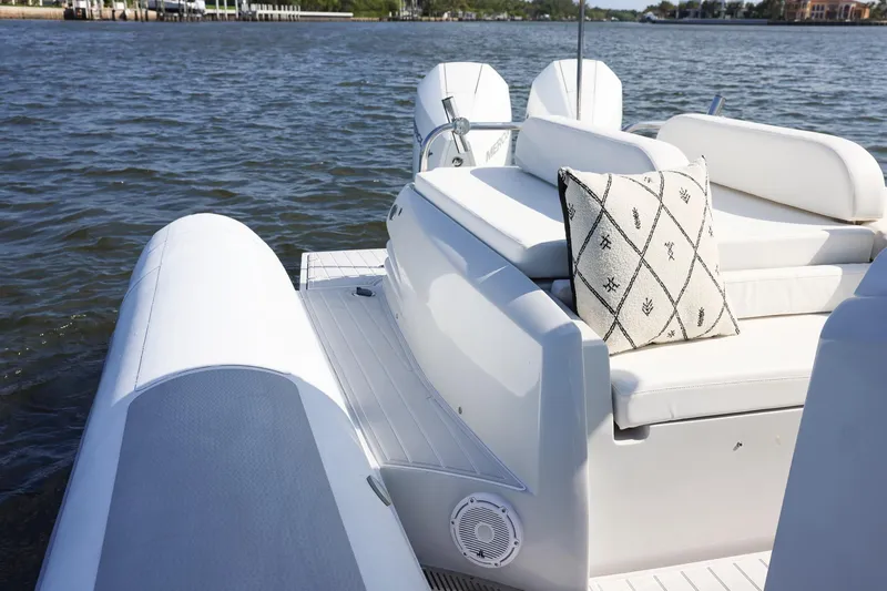 Slide: The Image of Luxury Zeta Elle 34 Custom boat interior with cushion, on calm water, 2013 model. - 26