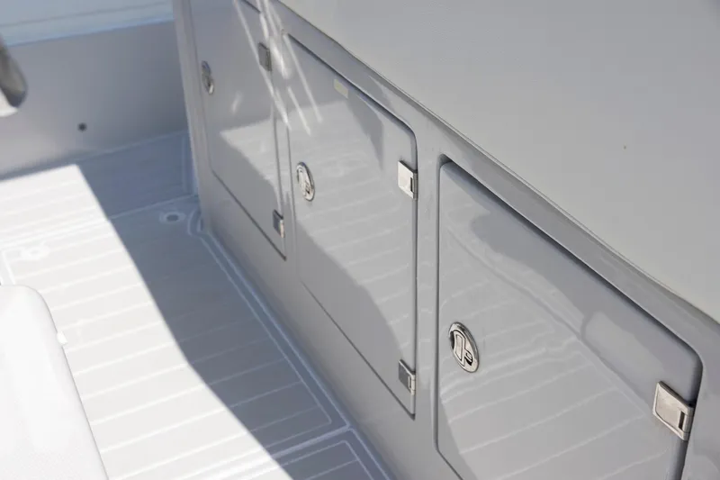 Slide: The Image of Storage compartments on a 2013 Zeta Elle 34 Custom boat deck. - 32