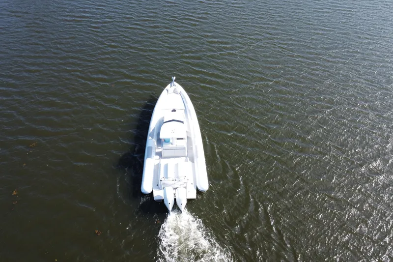 Slide: The Image of Aerial view of 2013 Zeta Elle 34 Custom boat cruising on open water. - 4