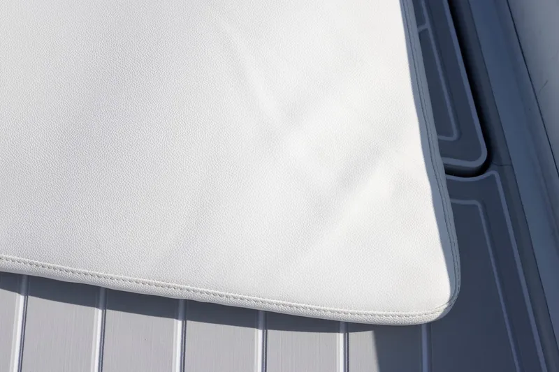 Slide: The Image of White cushion on a Zeta Elle 34 Custom boat deck, 2013 model. - 44