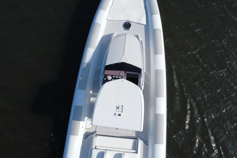 Slide: The Image of Overhead view of 2013 Zeta Elle 34 Custom boat on water. - 5
