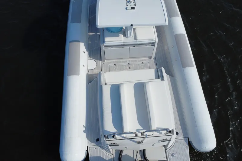 Slide: The Image of Overhead view of 2013 Zeta Elle 34 Custom boat on water. - 6