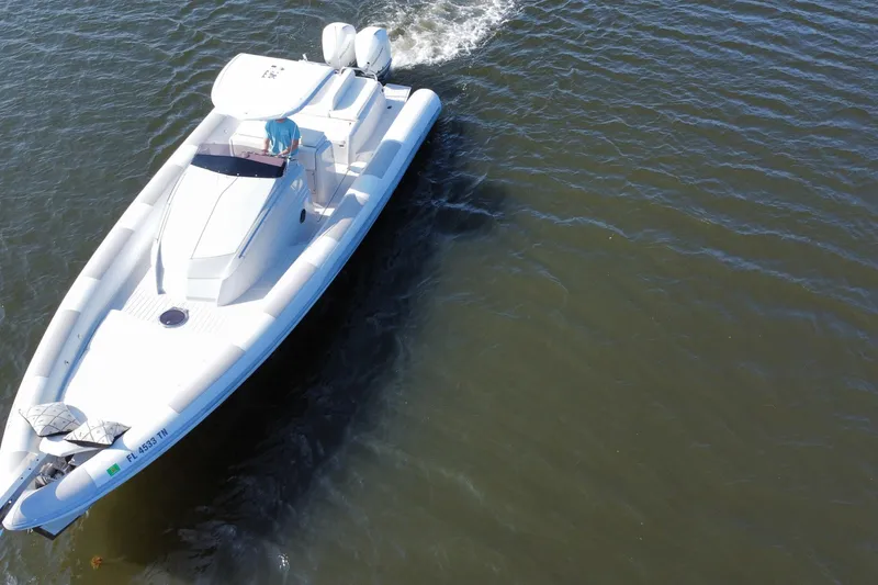Slide: The Image of Aerial view of 2013 Zeta Elle 34 Custom boat cruising on water. - 9