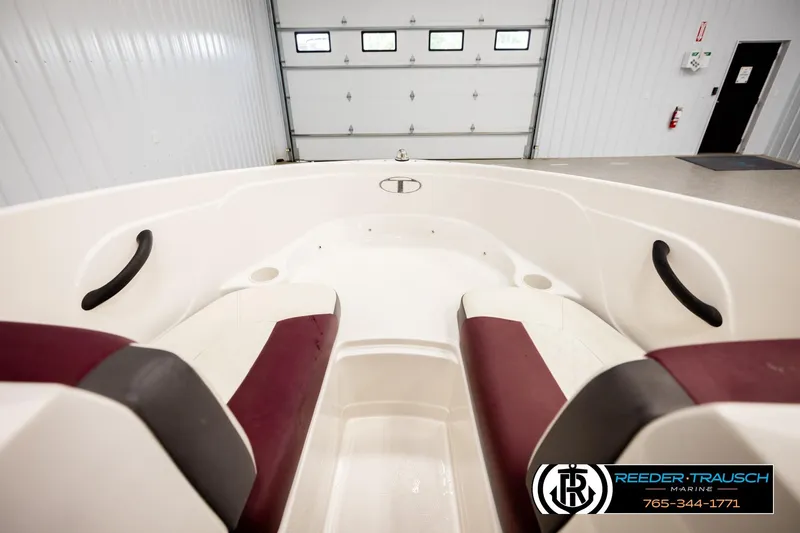 Slide: The Image of Interior view of a 2016 Tahoe 450 TS boat with maroon and white seating. - 20
