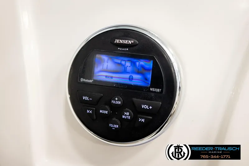 Slide: The Image of Jensen stereo system on 2016 Tahoe 450 TS boat dashboard, featuring Bluetooth connectivity. - 32