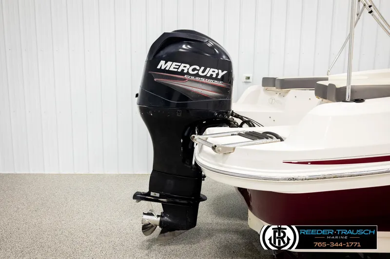 Slide: The Image of 2016 Tahoe 450 TS boat with Mercury FourStroke outboard motor in showroom. - 37
