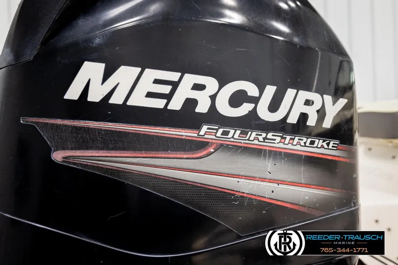 Slide: The Image of Mercury FourStroke engine on a 2016 Tahoe 450 TS boat, Reeder-Trausch Marine branding. - 38