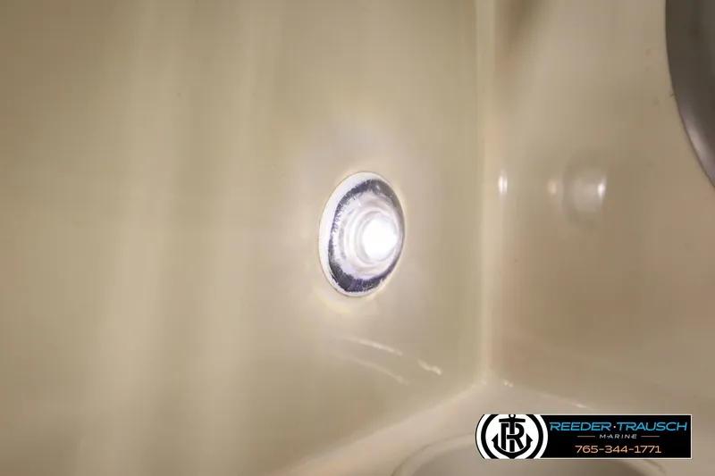 Slide: The Image of LED light inside a 2016 Tahoe 450 TS boat, illuminating the interior. - 43
