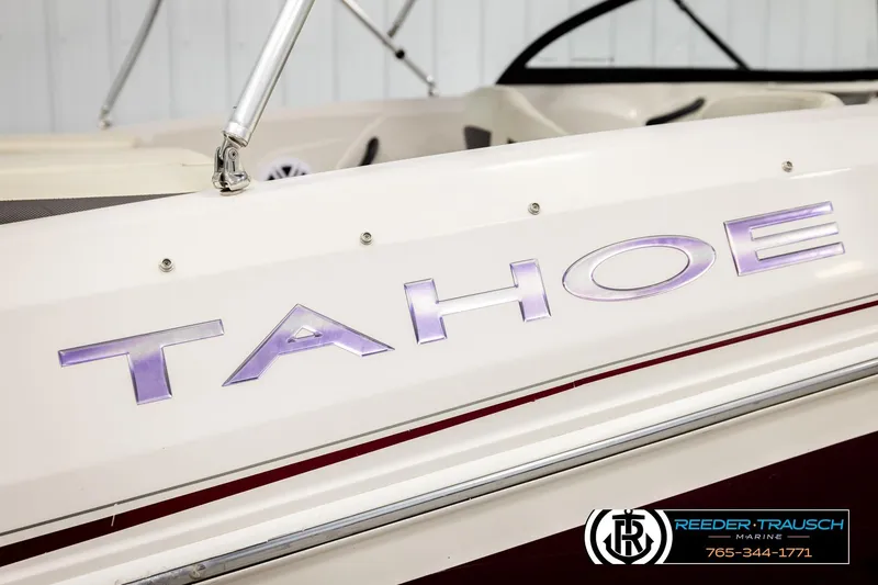 Slide: The Image of 2016 Tahoe 450 TS boat with logo, featuring sleek design and Reeder-Trausch Marine branding. - 46