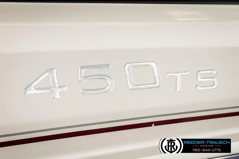 Slide: The Image of 2016 Tahoe 450 TS boat model emblem with Reeder Trausch Marine logo. - 47