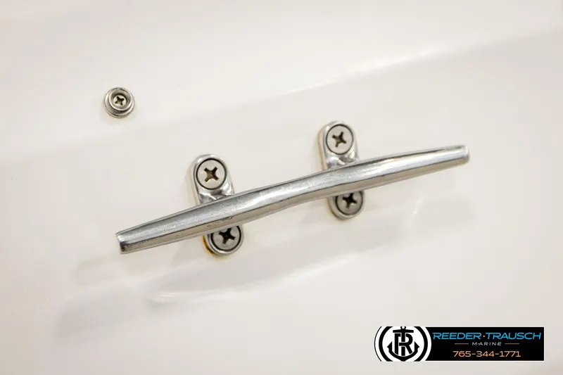 Slide: The Image of Chrome boat cleat on 2016 Tahoe 450 TS, Reeder-Trausch Marine branding visible. - 48
