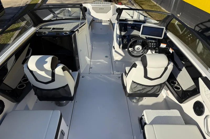 Slide: The Image of 2026 Yamaha Boats 222SD interior with modern seating and dashboard design. - 12