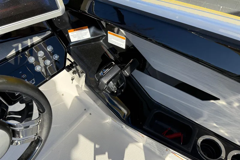 Slide: The Image of 2026 Yamaha Boats 222SD dashboard with steering wheel and control panel. - 16