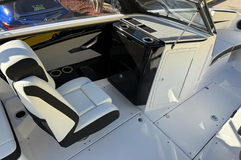 Slide: The Image of 2026 Yamaha Boats 222SD interior with sleek seating and modern console design. - 17