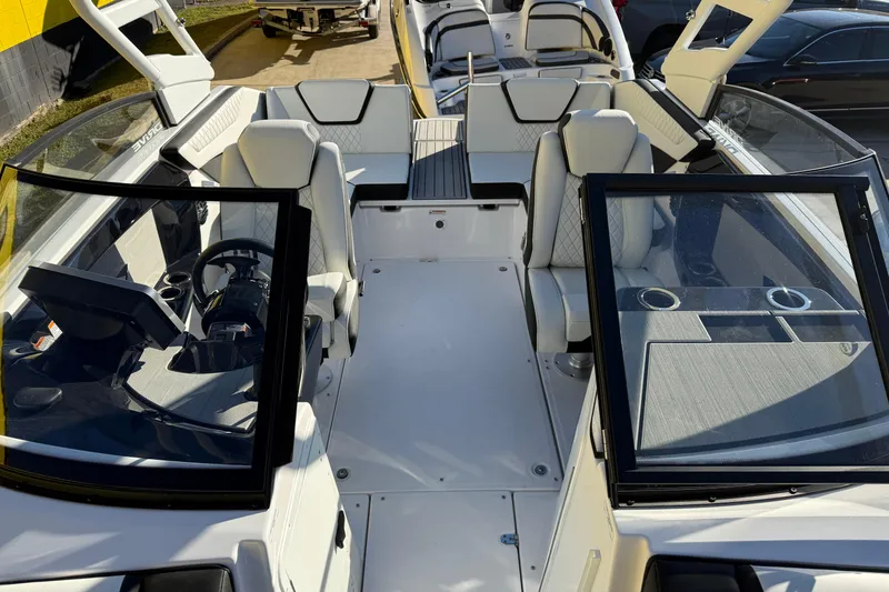 Slide: The Image of 2026 Yamaha Boats 222SD interior with modern seating and dashboard design. - 27