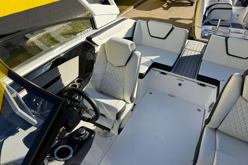 Slide: The Image of 2026 Yamaha Boats 222SD interior with modern seating and sleek dashboard design. - 28