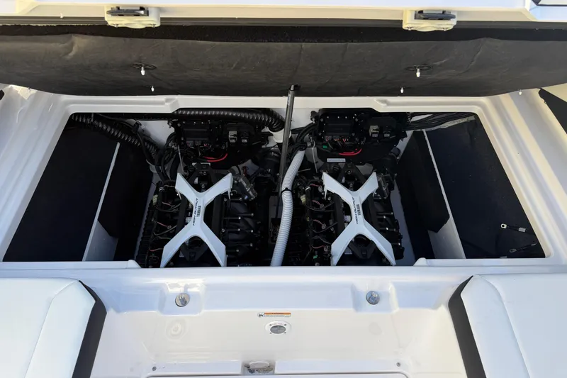 Slide: The Image of Engine compartment of 2026 Yamaha Boats 222SD, showcasing dual engines and components. - 33