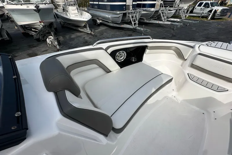 Slide: The Image of 2017 Yamaha Boats 242 Limited S interior seating with sleek design and comfortable upholstery. - 11