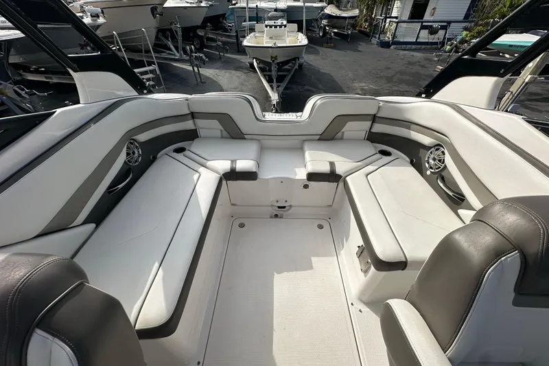 Slide: The Image of 2017 Yamaha Boats 242 Limited S interior with spacious seating and modern design. - 22