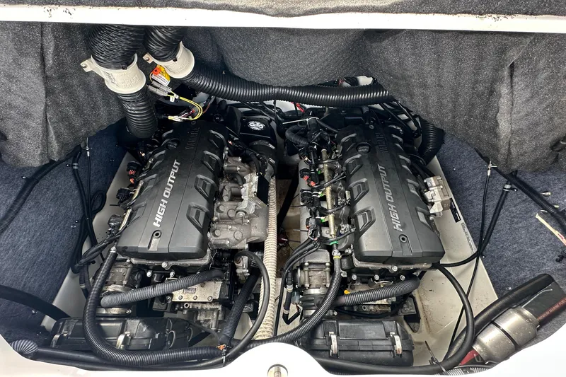 Slide: The Image of 2017 Yamaha Boats 242 Limited S engine compartment with dual high-output engines. - 27