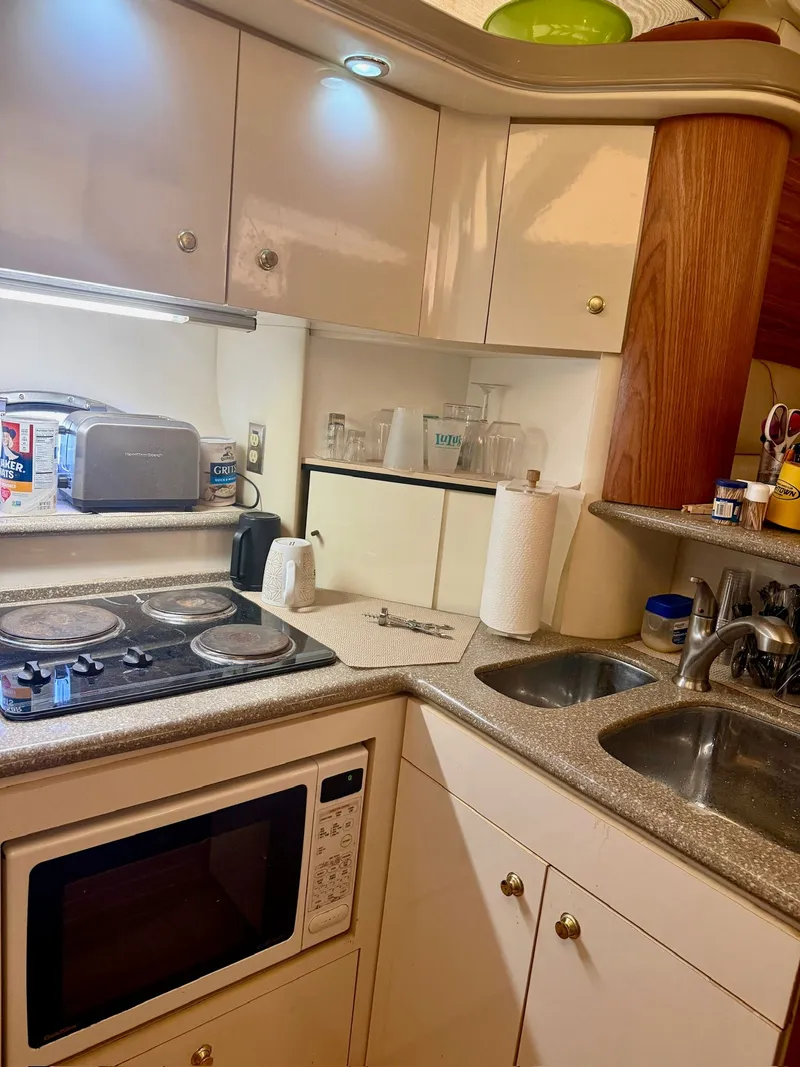 Slide: The Image of Kitchen area on Maxum 4100 SCA yacht, year 1999. - 12